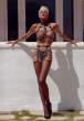 Brigitte Nielsen Topless with leather.jpg