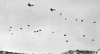 German_paratroopers_jumping_From_Ju_52s_over_Crete.jpg