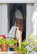 miranda_kerr_topless_balcony_5.jpg