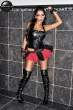 Tehmeena-Afzal-leaning-against-the-wall-modeling-a-black-corset-black-and-red-frilly-skirt-and-black-leather-boots-in-a-Felix-Natal-Jr-Photoshoot.jpg