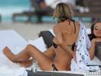 rita-rusic-black-bikini-tanning-miami-01-580x435.jpg