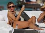 rita-rusic-black-bikini-tanning-miami-07-580x435.jpg