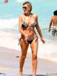 rita-rusic-black-bikini-tanning-miami-10-435x580.jpg