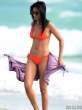 padma-lakshmi-in-an-orange-bikini-at-the-beach-04-435x580.jpg