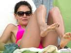 katie-holmes-poolside-in-a-neon-pink-bikini-in-miami-10-580x435.jpg