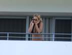 973060249_ritaorahangsoutbalconyx7_123_130lo.jpg