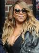 Mariah-Carey-Flashes-Cleavage-at-The-Late-Show-with-David-Letterman-in-NYC-06-435x580.jpg