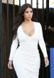 Kim Kardashian Leaves in backless white from the studio in Hollywood 27-08-2014 036.jpg