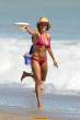 Lisa Rinna  sports a hot pink bikini while on the beach in Malibu. Aug 22, 2010 (2).jpg