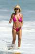 Lisa Rinna  sports a hot pink bikini while on the beach in Malibu. Aug 22, 2010 (11).jpg