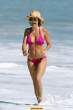 Lisa Rinna  sports a hot pink bikini while on the beach in Malibu. Aug 22, 2010 (16).jpg