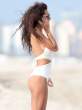 Raffaella-Modugno-Wears-A-White-One-PIece-Thong-To-The-Beach-In-Miami-01-675x900.jpg