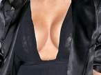 Kim-Kardashian-Deep-Shiny-Cleavage-In-Black-Heading-To-See-Kanye-At-SNL-40th-Anniversary-09-580x435.jpg
